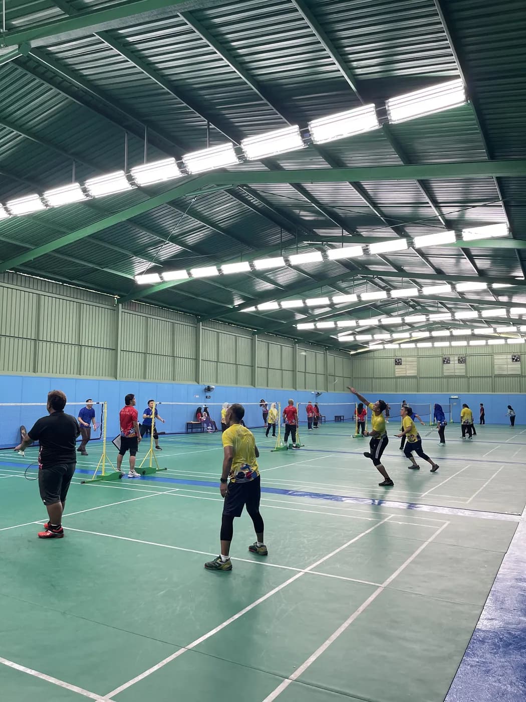 A rally in progress on one of the courts, with other courts in play behind