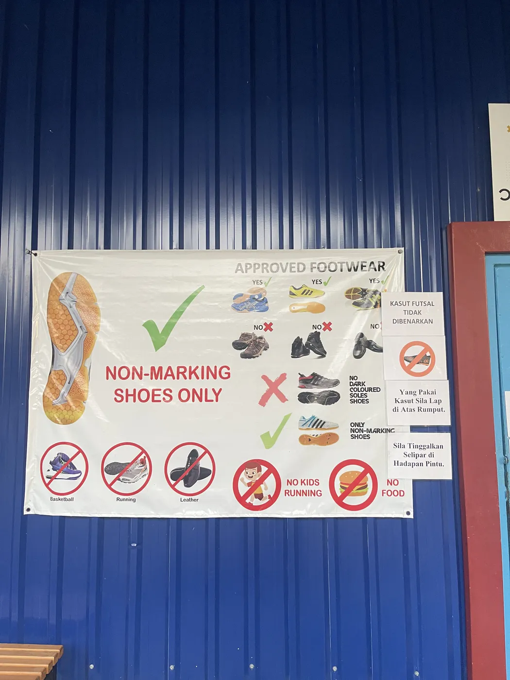 The approved-footwear notice on the wall by the court entrance